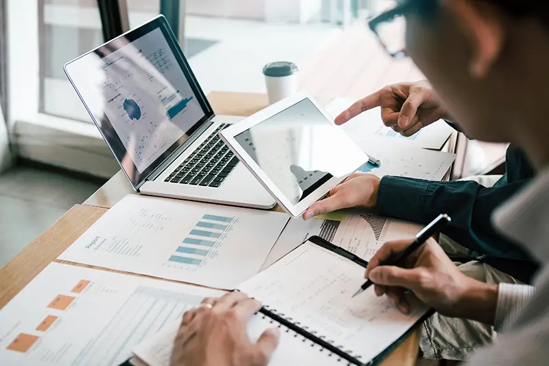 Trailer financial specialist analyzing a client's finances.